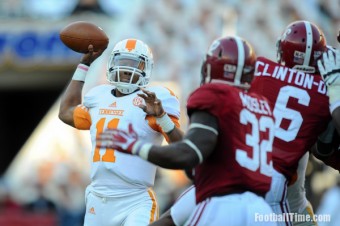 Vols fall to Alabama, 45-10, but Dobbs impresses in debut.